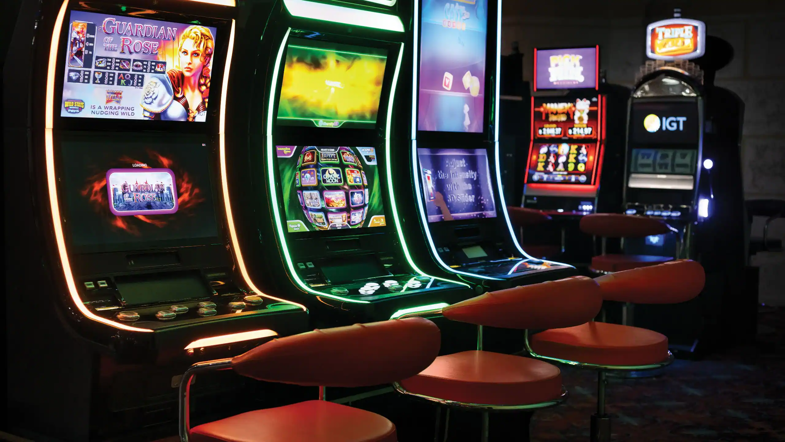 Modern slot machines inside the casino at Dreams La Romana Resort & Spa offering evening entertainment for guests.