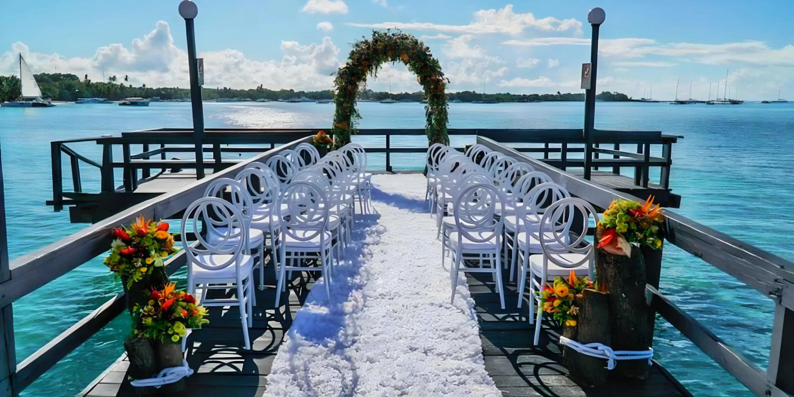 Oceanfront pier wedding venue at Dreams La Romana Resort & Spa Oceanfront pier wedding venue at Dreams La Romana Resort & Spa